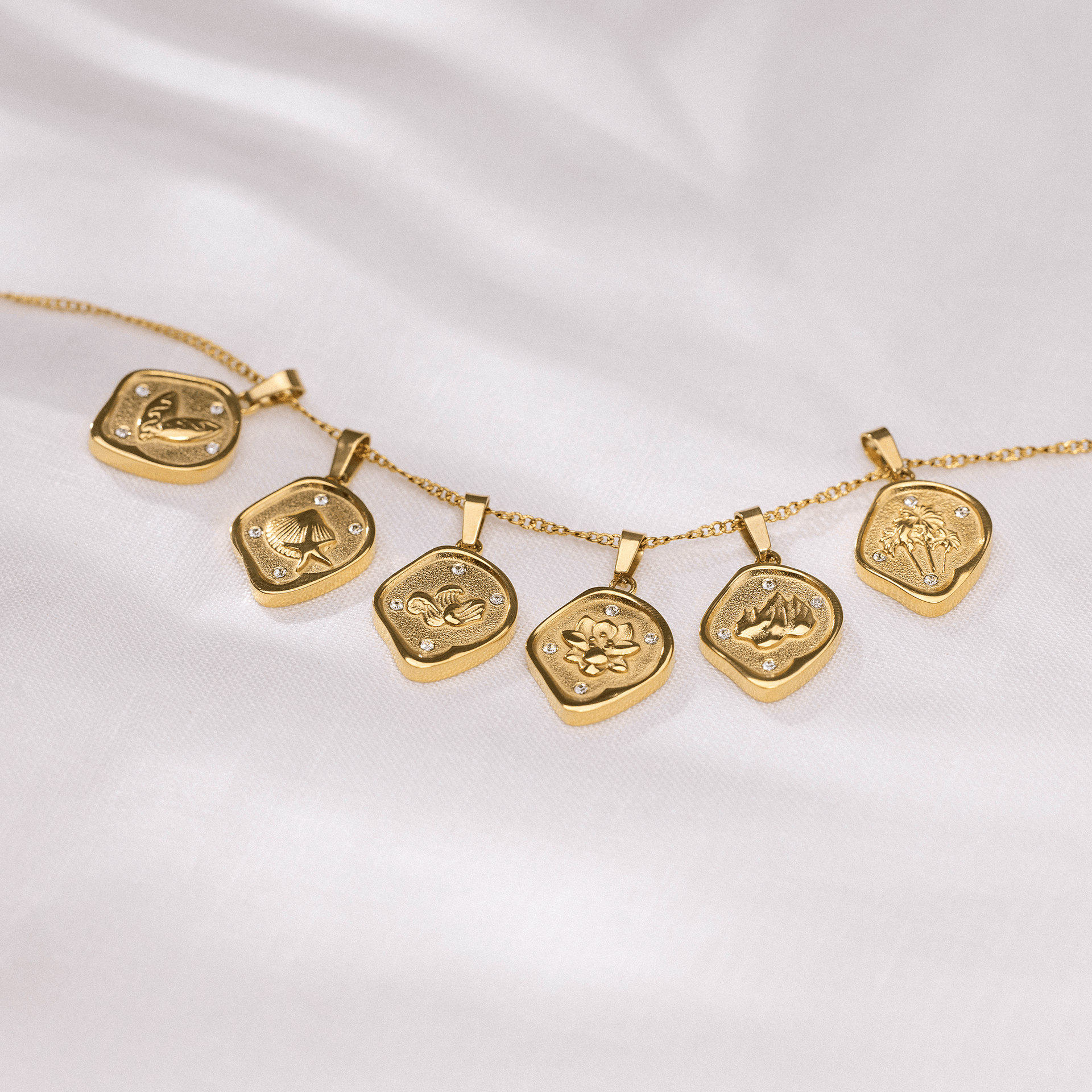 Charm a forma di moneta Wave