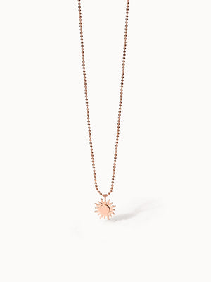 Roségoldene Kette mit Sonnenanhänger, PURELEI, elegant und strahlend.