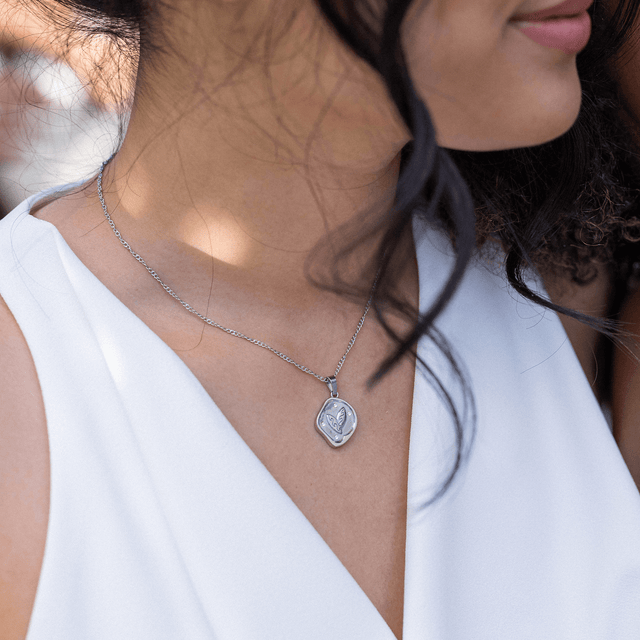 Charm per monete con tavole da surf