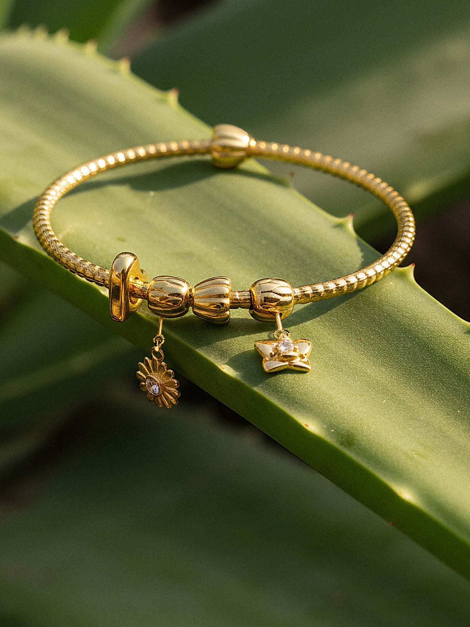 Bracciale Charm Lei con due charms Stopper