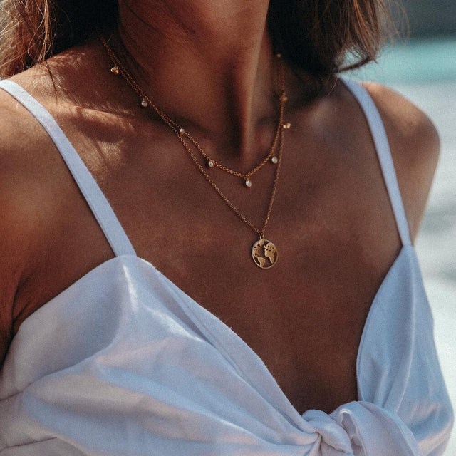 Collana con mappa del mondo
