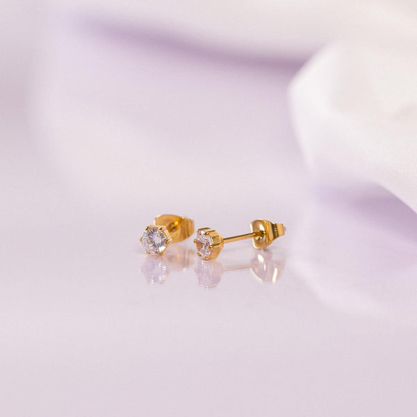 Zarte, roségoldene Ohrstecker mit funkelnden Steinen, PURELEI, elegant und feminin.