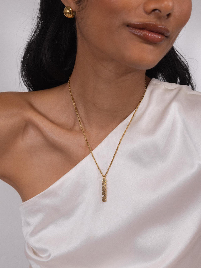 Charm a forma di lettera dello Scorpione