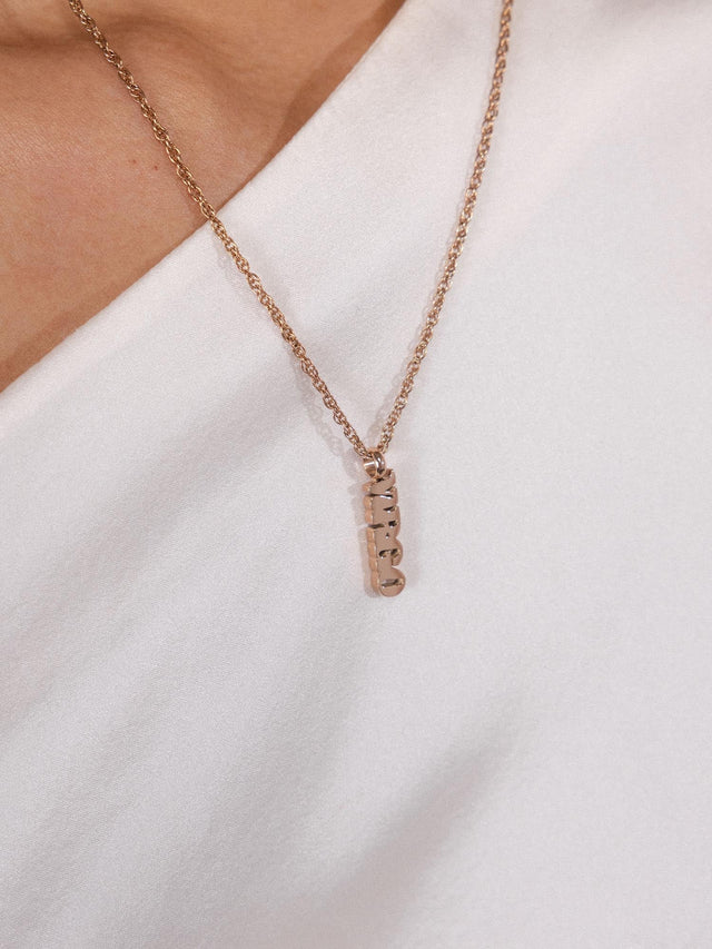 Charm a forma di lettera Virgo