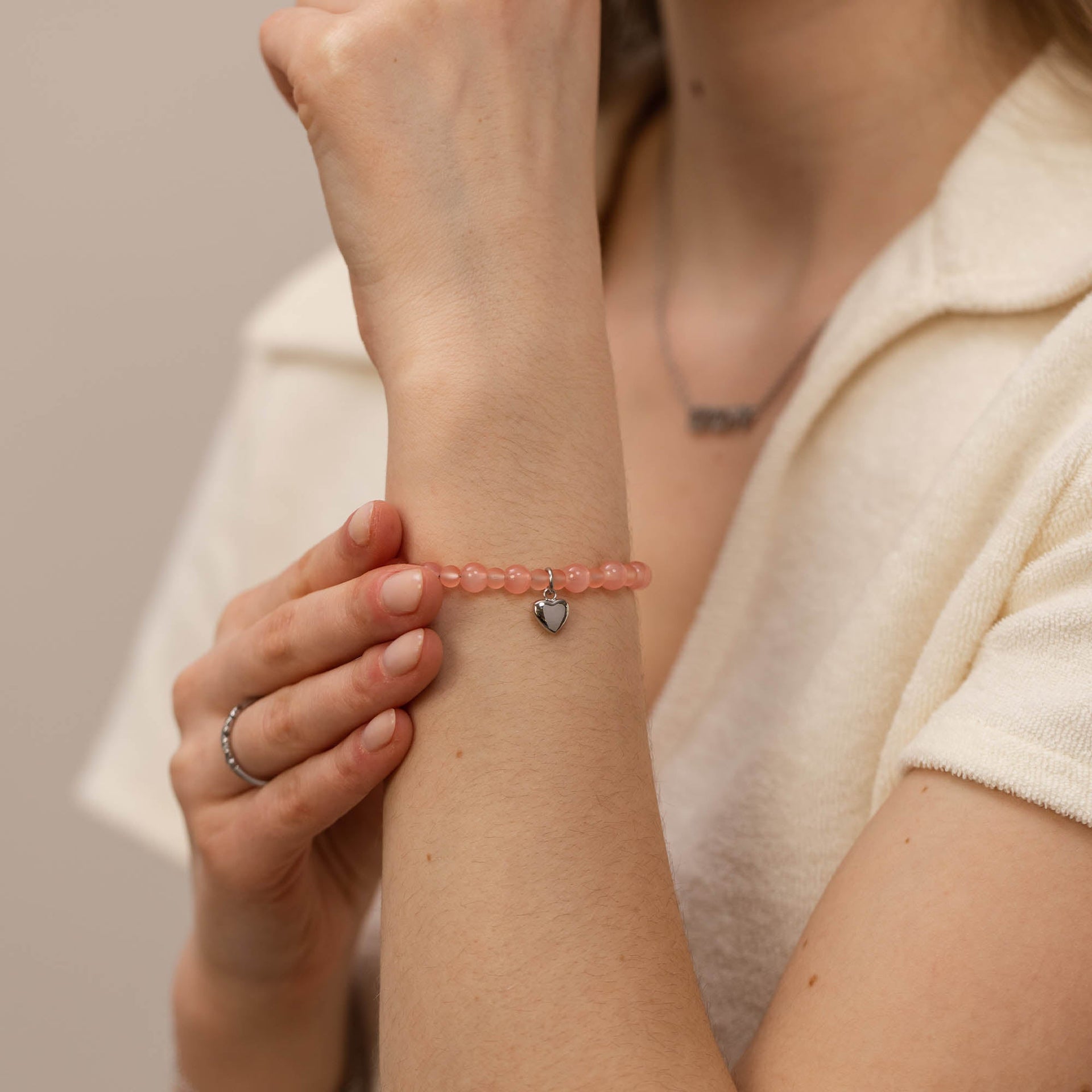 Bracciale con cuore di pesca