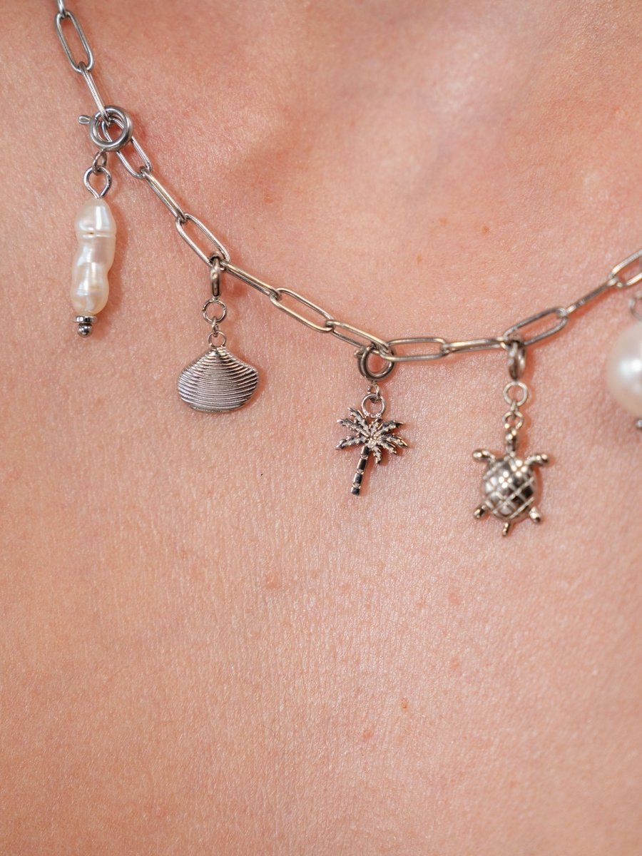 Flex Clamshell Charm - INT PURELEI
