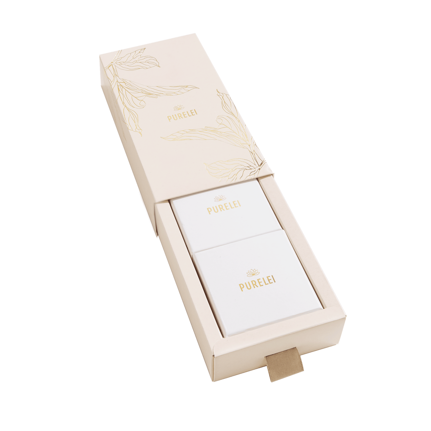 Elegante PURELEI Geschenkbox in sanftem Beige mit goldenen Akzenten.